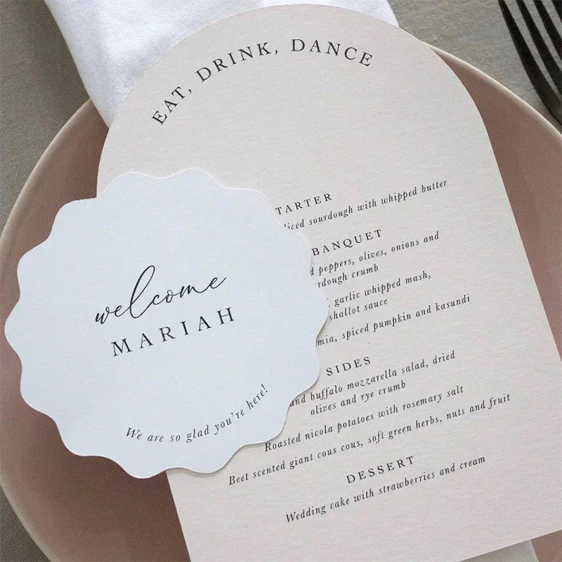 blush pink arch wedding menu cards with guest name tag