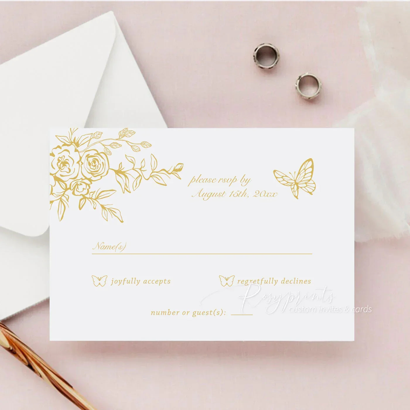 Gold floral and butterfly rsvp card with an envelope