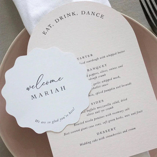 blush pink arch wedding menu cards with guest name tag