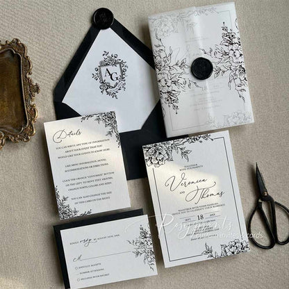 black and white garden floral vellum wrapped wedding invitations