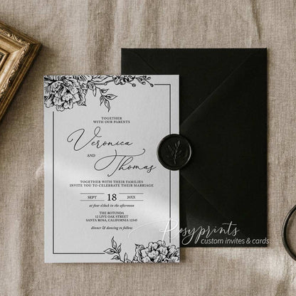 black and white garden floral vellum wrapped wedding invitations