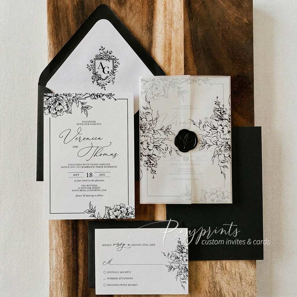 black and white garden floral vellum wrapped wedding invitations