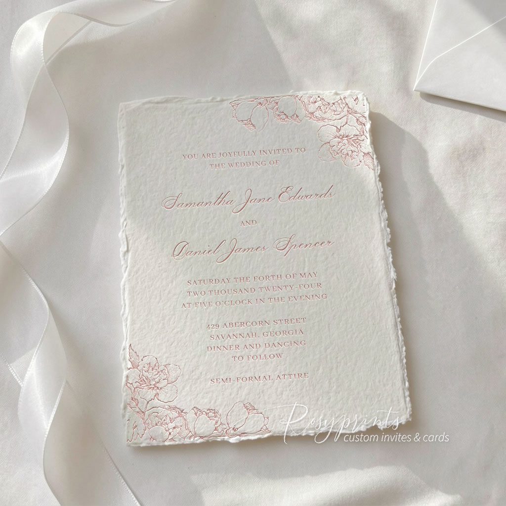 blush pink floral letterpress wedding invitations with deckled edge