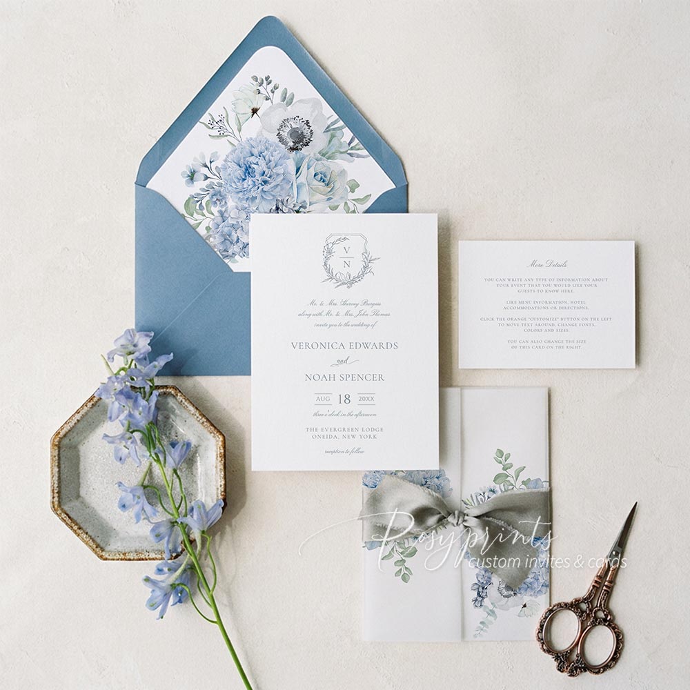 dusty blue white floral vellum wedding invitations