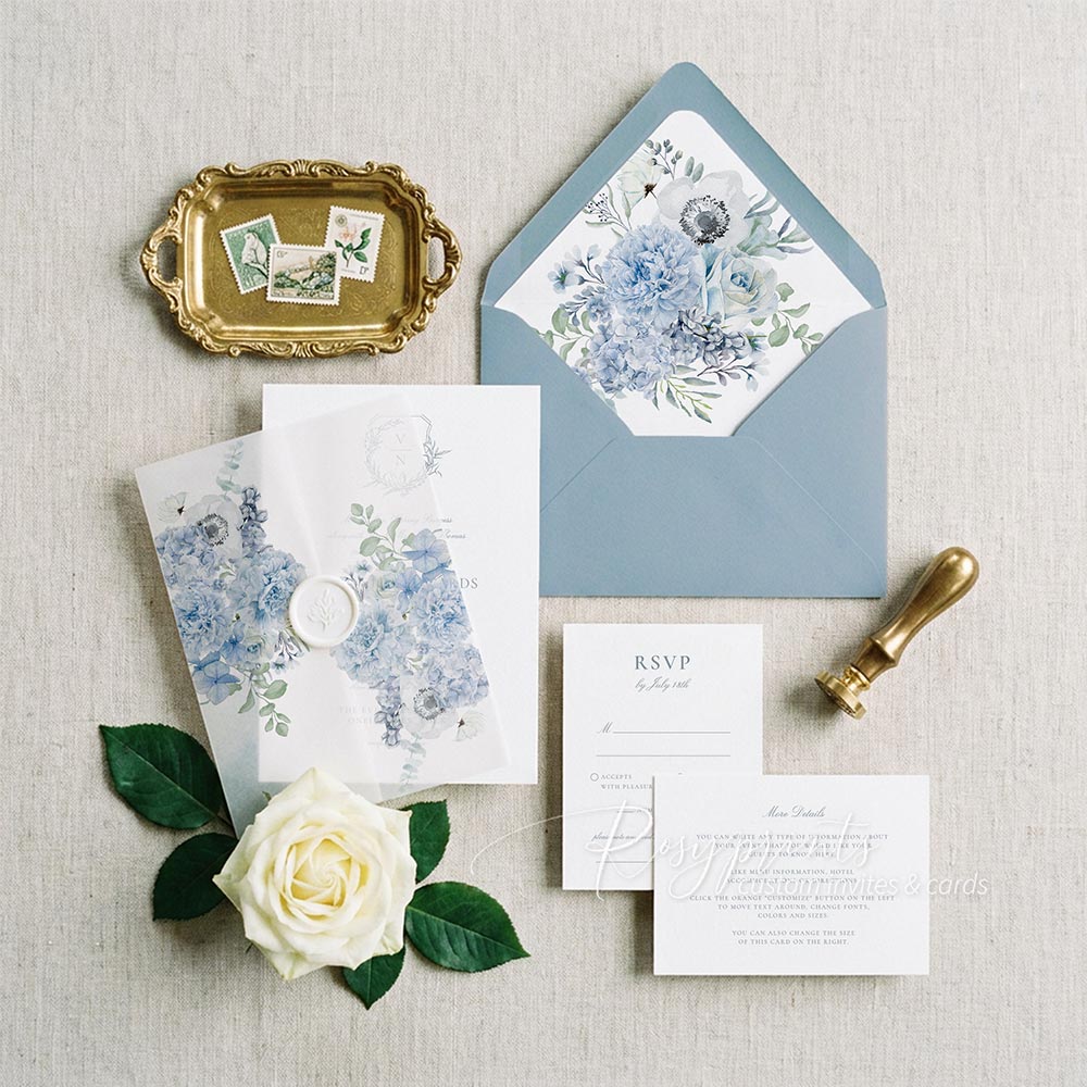 dusty blue white floral vellum wedding invitations