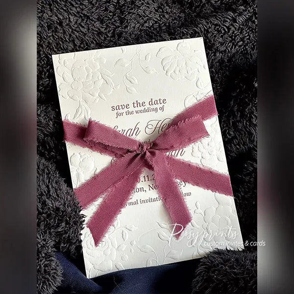 blind floral embossed letterpress wedding invitations