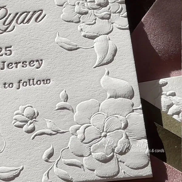 blind floral embossed letterpress wedding invitations