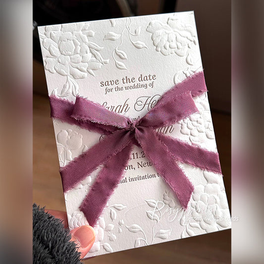 blind floral embossed letterpress wedding invitations