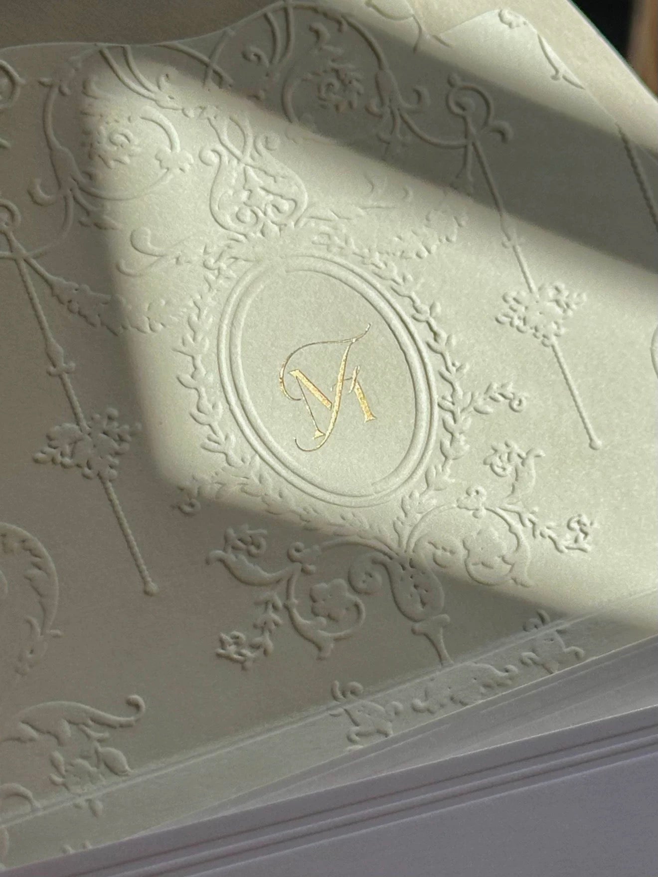 floral embossed wedding invitations with custom venue sketch