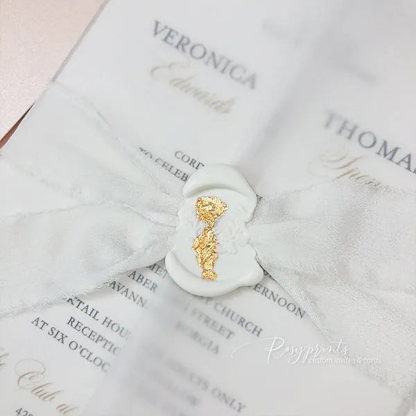 elegant white wedding invitation w/ vellum wrap ribbon and wax seal 