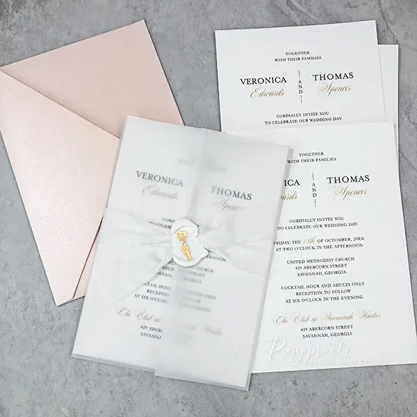 elegant white wedding invitation w/ vellum wrap ribbon and wax seal 
