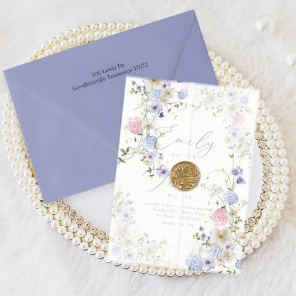 pastel wildflower pink blue and purple wedding invitations