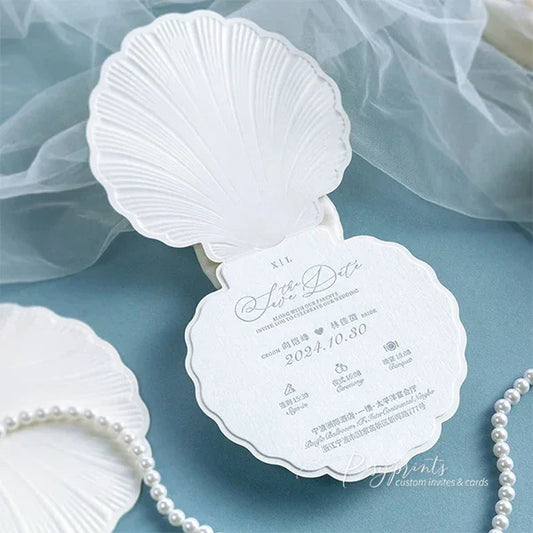 White shell-shaped invitation letter pressed wedding invite save the dates